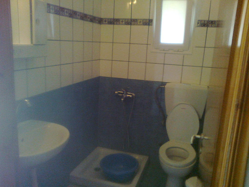Апартаменты House Mantesos Коинира Номер фото